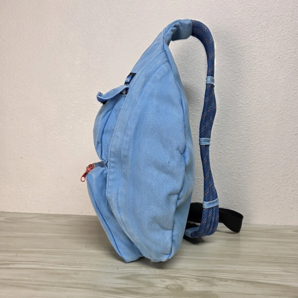 KAVU Denim Blue Sling Backpack with Orange Accents, Adjustable Rope Strap